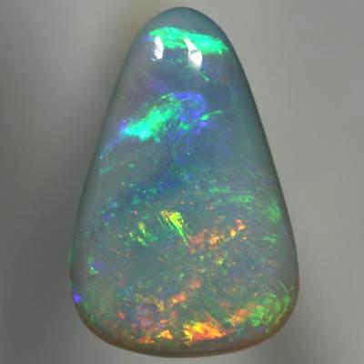 SOLID SEMI BLACK OPAL Sparkling orange moves to green rolling flashes